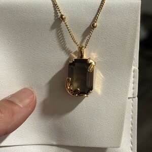 Elegant Gold and Black Pendant Necklace